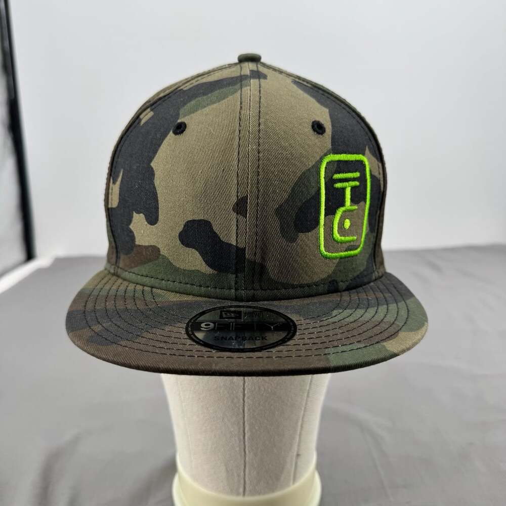 New Era 9FIFTY “Talking Cedar” Camo Snapback Hat with Neon Green Logo